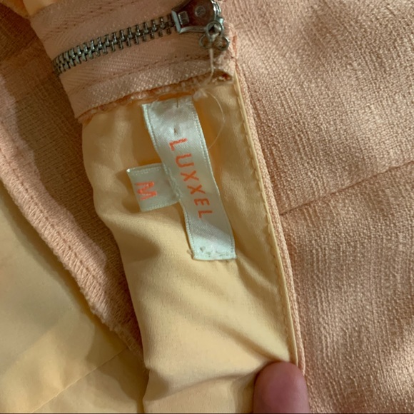 Peach colored sleeveless romper w/ open back - Picture 3 of 4